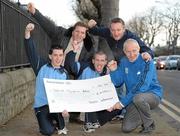 17 December 2010; Jim Augney, Race Director, Lifestyle Sports - Adidas Dublin City Marathon presents Special Olympics athletes Gary O'Brien, left, from Artane, Co. Dublin, and James Murphy, from Portmarnock, Co. Dublin, with a cheque for €6000, money raised as a result of this year’s Lifestyle Sports - Adidas Dublin City Marathon. Special Olympics Ireland was one of two nominated charities to benefit from this year’s marathon. Also pictured are Matt English, back left, CEO Special Olympics Ireland, and Paul Ahearne, back right, Special Olympics Eastern Region. Special Olympics Ireland, Park House, North Circular Road, Dublin. Photo by Sportsfile