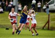 4 September 2016; Claire Delany of Longford in action against Lea Casey, left and Nuala Browne, both of Derry during the TG4 All Ireland Junior Football Championship Semi Final between Derry and Longford in Fingallians, Dublin.  Photo by Sam Barnes/Sportsfile