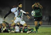 17 December 2010; Danny Care, Harlequins, clears under pressure from Ronan Loughney, Connacht. Amlin Challenge Cup, Pool 1, Round 3, Connacht v Harlequins, Sportsground, Galway. Picture credit: David Maher / SPORTSFILE