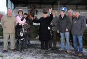18 December 2010; Oscars Wells, with jockey Robbie Power and owner Michael O'Hare, 4th from left, trainer Jessica Harrington, and members of the winning syndicate after wining The Navan Novice Hurdle. Navan Racecourse, Proudstown, Navan, Co. Meath. Picture credit: Barry Cregg / SPORTSFILE