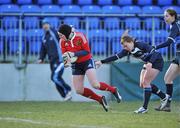 18 December 2010; Laura Guest, Munster, goes over to score her side's third try despite the challange of Amy Davis, Leinster. Women's Interprovincial Final, Leinster v Munster, Donnybrook Stadium, Donnybrook, Dublin. Picture credit: David Maher / SPORTSFILE