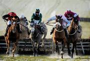 18 December 2010; Alpine Glade, with Barry Cash up, jumps the last ahead of Stonemaster, right, with Davy Russell up, Son Amix, centre, with Bryan Cooper up, and eventual winner Rigour Back Bob, far left, with Andrew McNamara up, as they make their way to post during The Philips Electronics Tara Hurdle. Navan Racecourse, Proudstown, Navan, Co. Meath. Picture credit: Barry Cregg / SPORTSFILE