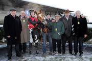 18 December 2010; Rigour Back Bob, with jockey Andrew McNamara, third from left, and the owning Gaticoma syndicate, including Galway hurling manager John McIntyre, second from right, after winning The Philips Electronics Tara Hurdle. Navan Racecourse, Proudstown, Navan, Co. Meath. Picture credit: Barry Cregg / SPORTSFILE