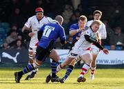 18 December 2010; Nevin Spence, Ulster Rugby, is tackled by Andy Beattie, Bath Rugby. Heineken Cup, Pool 4, Round 4, Bath Rugby v Ulster Rugby, Recreation Ground, Bath, England. Picture credit: Matthew Impey / SPORTSFILE
