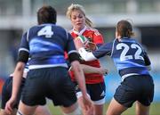 18 December 2010; Olivia Stapleton, Munster, is tackled by Marie Louise Reilly, left, and Tammy Breen, Leinster. Women's Interprovincial Final, Leinster v Munster, Donnybrook Stadium, Donnybrook, Dublin. Picture credit: David Maher / SPORTSFILE