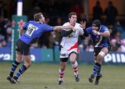 18 December 2010; Ruan Pienaar, Ulster Rugby, is tackled by Butch James, left, and Danny Grewcock, Bath Rugby. Heineken Cup, Pool 4, Round 4, Bath Rugby v Ulster Rugby, Recreation Ground, Bath, England. Picture credit: Matthew Impey / SPORTSFILE