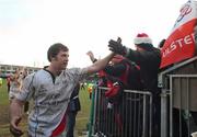 18 December 2010; Willie Faloon, Ulster Rugby, celebrates with fans after the game. Heineken Cup, Pool 4, Round 4, Bath Rugby v Ulster Rugby, Recreation Ground, Bath, England. Picture credit: Matthew Impey / SPORTSFILE
