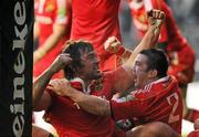 18 December 2010; Tony Buckley, Munster, celebrates after scoring his side's first try with team-mate Damien Varley, right. Heineken Cup, Pool 3, Round 4, Ospreys v Munster, Liberty Stadium, Swansea, Wales. Picture credit: Stephen McCarthy / SPORTSFILE