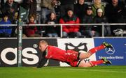 18 December 2010; Keith Earls, Munster, goes over for his side's second try. Heineken Cup, Pool 3, Round 4, Ospreys v Munster, Liberty Stadium, Swansea, Wales. Picture credit: Stephen McCarthy / SPORTSFILE
