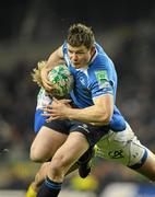 18 December 2010; Brian O'Driscoll, Leinster, is tackled by Aurelien Rougerie, ASM Clermont Auvergne. Heineken Cup, Pool 2, Round 4, Leinster v ASM Clermont Auvergne, Aviva Stadium, Lansdowne Road, Dublin. Picture credit: Brendan Moran / SPORTSFILE