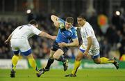 18 December 2010; Brian O'Driscoll, Leinster, in action against Thomas Domingo, left, and Ti'i Paulo, ASM Clermont Auvergne. Heineken Cup, Pool 2, Round 4, Leinster v ASM Clermont Auvergne, Aviva Stadium, Lansdowne Road, Dublin. Picture credit: Brendan Moran / SPORTSFILE