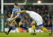 18 December 2010; Brian O'Driscoll, Leinster, is tackled by Ti'i Paulo, ASM Clermont Auvergne. Heineken Cup, Pool 2, Round 4, Leinster v ASM Clermont Auvergne, Aviva Stadium, Lansdowne Road, Dublin. Picture credit: Brendan Moran / SPORTSFILE