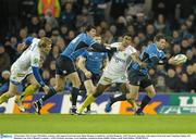 18 December 2010; Fergus McFadden, Leinster, with support from team mate Shane Horgan, is tackled by Aurelien Rougerie, ASM Clermont Auvergne, with support from team mate Napolioni Nalaga, left. Heineken Cup, Pool 2, Round 4, Leinster v ASM Clermont Auvergne, Aviva Stadium, Lansdowne Road, Dublin. Photo by Sportsfile