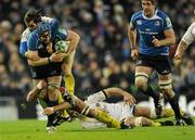 18 December 2010; Sean O'Brien, Leinster, is tackled by Morgan Parra and Alexandre Audebert, right, ASM Clermont Auvergne. Heineken Cup, Pool 2, Round 4, Leinster v ASM Clermont Auvergne, Aviva Stadium, Lansdowne Road, Dublin. Picture credit: Matt Browne / SPORTSFILE