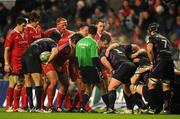18 December 2010; Munster and Ospreys players prepare for a scrum. Heineken Cup, Pool 3, Round 4, Ospreys v Munster, Liberty Stadium, Swansea, Wales. Picture credit: Stephen McCarthy / SPORTSFILE