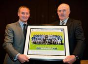 19 December 2010; Dublin County Board Chairman Gerry Harrington is presented with a framed picture of the 2010 Dublin All-Ireland U-21 squad by Dublin manager Jim Gavin. The Officers Mess, Baldonnell, Dublin. Picture credit: Barry Cregg / SPORTSFILE