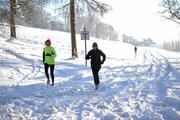 25 December 2010; Runners out for a jog in Dublin's Phoenix Park on Christmas Day. Phoenix Park, Dublin. Picture credit: Ray McManus / SPORTSFILE