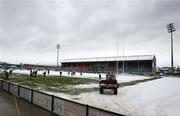 26 December 2010; A general view of Ravenhill as Ulster Rugby officials, staff and supporters remove the snow from the Ravenhill pitch ahead of Ulster's Celtic League clash against Leinster, on Monday 27th December. Ravenhill, Belfast, Antrim. Picture credit: John Dickson / SPORTSFILE