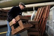 27 December 2010; Groundsman Denis Byrne sets up the bookmakers stands in preperation after a thaw in weather conditions, which could lead to the Christmas Racing Festival being given the go-ahead after recent snow postponed the first two days of the meeting, pending a course inspection at 7.30 am tomorrow morning. Leopardstown Racecourse, Leopardstown, Dublin. Picture credit: Barry Cregg / SPORTSFILE