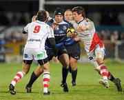 27 December 2010; Mike Ross, Leinster, in action against Ruan Pienaar and Robbie Diack, Ulster. Celtic League, Ulster v Leinster, Ravenhill Park, Belfast. Picture credit: Oliver McVeigh / SPORTSFILE