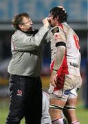27 December 2010; Ulster Doctor David Irwin attends to Pedrie Wannenburg. Celtic League, Ulster v Leinster, Ravenhill Park, Belfast. Picture credit: John Dickson / SPORTSFILE