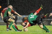27 December 2010; Paul Warwick, Munster, is tackled by Darragh Fanning, Connacht. Celtic League, Connacht v Munster, Sportsground, Galway. Picture credit: Diarmuid Greene / SPORTSFILE