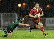 27 December 2010; Paul Warwick, Munster, is tackled by Cillian Willis, Connacht. Celtic League, Connacht v Munster, Sportsground, Galway. Picture credit: Diarmuid Greene / SPORTSFILE
