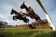 28 December 2010; Harold's Cross, with Roger Loughran up, and Sizing Africa, left, with Andrew Lynch up, jumps the last during the The Mongey Communications Novice Handicap Hurdle. Leopardstown Christmas Racing Festival 2010, Leopardstown Racecourse, Leopardstown, Dublin. Picture credit: Matt Browne / SPORTSFILE