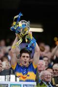 4 September 2016; Barry Heffernan of Tipperary lifts the trophy following his team's victory in the GAA Hurling All-Ireland Senior Championship Final match between Kilkenny and Tipperary at Croke Park in Dublin. Photo by Seb Daly/Sportsfile