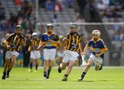 4 September 2016; Mark Holohan, Scoil Naomh Feichin, Termonfechin, Louth, representing Kilkenny, in action against Eamon Cassidy, St Brigids, Maghera, Derry, representing Tipperary,  during the Go Games during the GAA Hurling All-Ireland Senior Championship Final match between Kilkenny and Tipperary at Croke Park in Dublin. Photo by Ray McManus/Sportsfile