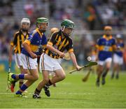 4 September 2016; Mark Holohan, Scoil Naomh Feichin, Termonfechin, Louth, representing Kilkenny, in action against Jack Morrissey, Ballyhea NS, Charleville, Cork, representing Tipperary, during the Go Games during the GAA Hurling All-Ireland Senior Championship Final match between Kilkenny and Tipperary at Croke Park in Dublin. Photo by Ray McManus/Sportsfile