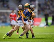 4 September 2016; Emmet McGirl, St Mary's NS, Aughnasheelin, Leitrim, representing Tipperary, in action against Paudie Heavin, Scoil Mhuire na mBuachaillí, Castleblayney, Monaghan, representing Kilkenny, during the Go Games during the GAA Hurling All-Ireland Senior Championship Final match between Kilkenny and Tipperary at Croke Park in Dublin. Photo by Ray McManus/Sportsfile