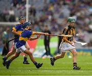 4 September 2016; `Mark Holohan, Scoil Naomh Feichin, Termonfechin, Louth, representing Kilkenny, in action against Tristan O'Tuama, Gaelscoil Durlas, Thurles, Tipperary, during the Go Games during the GAA Hurling All-Ireland Senior Championship Final match between Kilkenny and Tipperary at Croke Park in Dublin. Photo by Ray McManus/Sportsfile