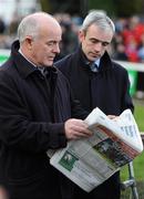 29 December 2010; Jockey Ruby Walsh, right, and his father Ted look at the newpaper during the day's racing. Leopardstown Christmas Racing Festival 2010, Leopardstown Racecourse, Leopardstown, Dublin. Picture credit: Stephen McCarthy / SPORTSFILE