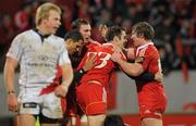 1 January 2011; Barry Murphy, Munster, is congratulated by team-mate Jerry Flannery after scoring his try. Celtic League, Munster v Ulster, Thomond Park, Limerick. Picture credit: Diarmuid Greene / SPORTSFILE