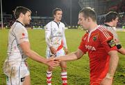 1 January 2011; Tomas O'Leary, Munster, exchanges a handshake with Tommy Seymour, Ulster after the game. Celtic League, Munster v Ulster, Thomond Park, Limerick. Picture credit: Diarmuid Greene / SPORTSFILE
