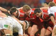 1 January 2011; The Munster front row of Tony Buckley, Jerry Flannery and Wian du Preez prepare for a scrum. Celtic League, Munster v Ulster, Thomond Park, Limerick. Picture credit: Diarmuid Greene / SPORTSFILE