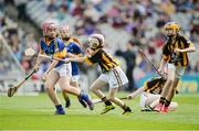 4 September 2016; Ava Maloney, Shinrone NS, Shinrone, Birr, Offaly, representing Tipperary, in action against Evan Geoghegan, Kildalkey NS, Kildalkey, Meath, representing Kilkenny, during the INTO Cumann na mBunscol GAA Respect Exhibition Go Games at the GAA Hurling All-Ireland Senior Championship Final match between Kilkenny and Tipperary at Croke Park in Dublin. Photo by Piaras Ó Mídheach/Sportsfile
