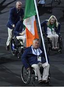 7 September 2016; Team Ireland flagbearer John Twomey leads the team during the Opening Ceremony in the Maracana Stadium at the 2016 Paralympic Games in Rio de Janeiro, Brazil. Photo by Diarmuid Greene/Sportsfile