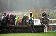 30 December 2010; Fearless Falcon, far right, with Keith Donoghue up, jumps the first ahead of Kristal Komet, left, with Paul Townend up, followed by from left, What a Charm, with Paddy Flood up, Toner D'Oudairies, with Davy Russell up, Accidental Outlaw, with Martin Walsh up, and Al Dafa, with Paul Carberry up, during The Bord na Mona Fire Magic Juvenile Hurdle. Leopardstown Christmas Racing Festival 2010, Leopardstown Racecourse, Leopardstown, Dublin. Picture credit: Barry Cregg / SPORTSFILE