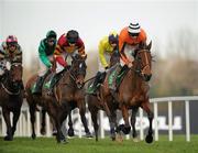 28 December 2010; Oscar Dan Dan, right, with Davy Russell up, leads Powerstation, left, with Barry Geraghty up, first time round, during The woodiesdiy.com Christmas Hurdle. Leopardstown Christmas Racing Festival 2010, Leopardstown Racecourse, Leopardstown, Dublin. Picture credit: Barry Cregg / SPORTSFILE