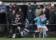 8 January 2011; Corey Hircock, Garryowen, escapes the tackle of Conal Keane, Old Belvedere. All-Ireland League Division 1A, Old Belvedere v Garryowen, Anglesea Road, Ballsbridge, Dublin. Picture credit: Stephen McCarthy / SPORTSFILE