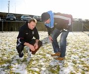 9 January 2011; Dublin manager Pat Gilory, right, and Westmeath manager Pat Flanagan inspect the pitch ahead of the game. Referee Fergal Kelly subsequently made the decision not to play the game due to the overnight frost. O'Byrne Cup, Westmeath v Dublin, St. Loman's GAA Club, Lakepoint Park, Mullingar, Co. Westmeath. Picture credit: Stephen McCarthy / SPORTSFILE