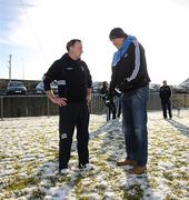 9 January 2011; Dublin manager Pat Gilory, right, and Westmeath manager Pat Flanagan inspect the pitch ahead of the arrival of the referee. Referee Fergal Kelly subsequently made the decision not to play the game due to the overnight frost. O'Byrne Cup, Westmeath v Dublin, St. Loman's GAA Club, Lakepoint Park, Mullingar, Co. Westmeath. Picture credit: Stephen McCarthy / SPORTSFILE