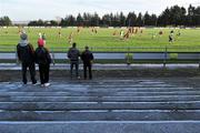 9 January 2011; Mayo supporters watch the Mayo team training after the match was postponed by referee TJ Keavney who deemed the pitch unplayable. FBD Connacht League, Mayo v Leitrim, Sean O'Heslin Park, Ballyhaunis GAA Club, Ballyhaunis, Co Mayo. Picture credit: Brian Lawless / SPORTSFILE