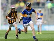 4 September 2016; William Beresford, Garranbane NS, Dungarvan, Waterford, representing Tipperary, in action against Oisín Smith, Bruskey NS, Bruskey Ballinagh, Cavan, representing Kilkenny, during the INTO Cumann na mBunscol GAA Respect Exhibition Go Games at the GAA Hurling All-Ireland Senior Championship Final match between Kilkenny and Tipperary at Croke Park in Dublin. Photo by Eóin Noonan/Sportsfile