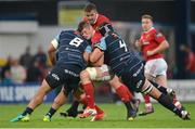 9 September 2016; Jack O'Donoghue of Munster is tackled by Nick Williams, left, and George Earle of Cardiff Blues during the Guinness PRO12 Round 2 match between Munster and Cardiff Blues at Irish Independent Park in Cork. Photo by Piaras Ó Mídheach/Sportsfile