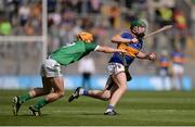 4 September 2016; Paddy Cadell of Tipperary in action against Darragh Carroll of Limerick during the Electric Ireland GAA Hurling All-Ireland Minor Championship Final in Croke Park, Dublin.  Photo by Piaras Ó Mídheach/Sportsfile
