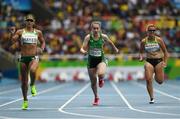 10 September 2016; Orla Comerford of Ireland, alongside Lisa Hayes, left, of Russia and Janne Sophie Engeleiter, right, of Germany on her way to finishing 4th during Heat 1 of the Women's 100m T13 at the Olympic Stadium during the Rio 2016 Paralympic Games in Rio de Janeiro, Brazil. Photo by Sportsfile
