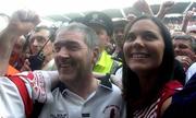 28 September 2003; Tyrone manager Mickey Harte celebrates at the end of the game with his daughter Michaela after victory over Armagh. Bank of Ireland All-Ireland Senior Football Championship Final, Armagh v Tyrone, Croke Park, Dublin. Picture credit; David Maher  / SPORTSFILE